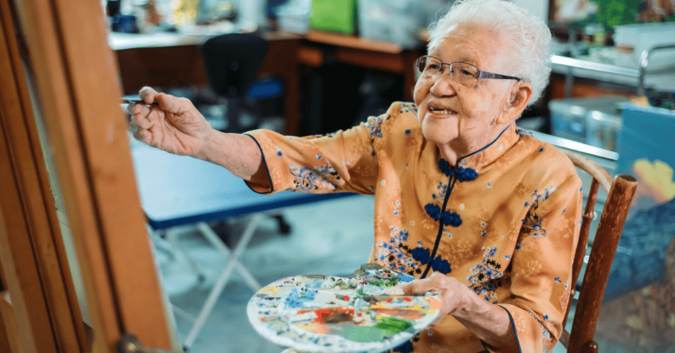 senior woman painting art theory
